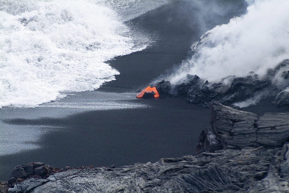 Hot lava flowing onto beach and into the ocean, Kilauea Volcano, Hawaii Volcanoes National Park, UNESCO World Heritage Site, Island of Hawaii (Big Island), Hawaii, United States of America, North America