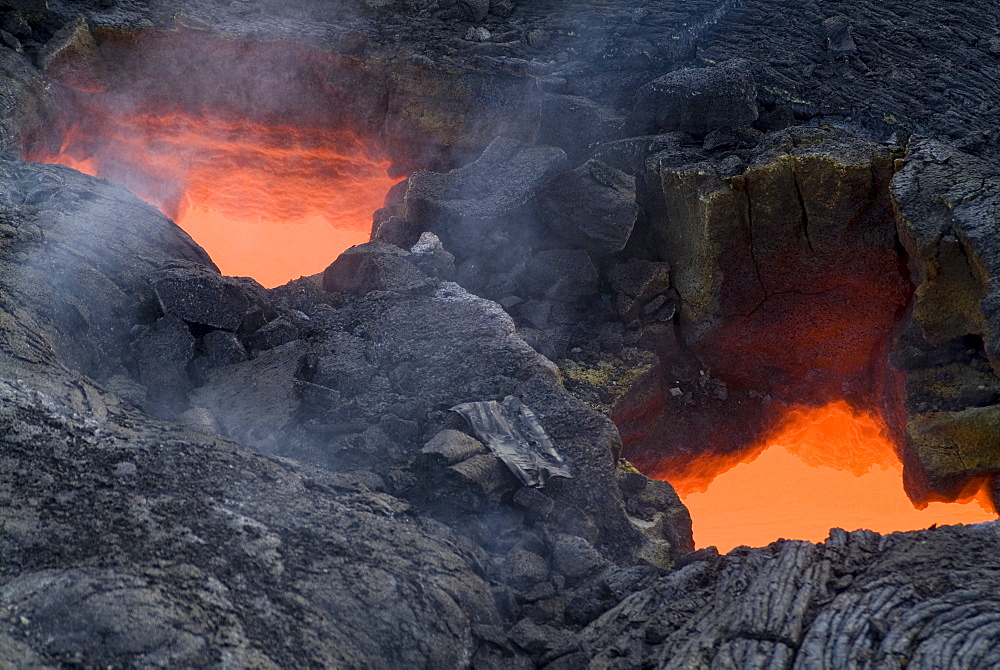 Skylight, view through cooled lava to molten lava below, Kilauea Volcano, Hawaii Volcanoes National Park, Island of Hawaii (Big Island', Hawaii, United States of America, North America