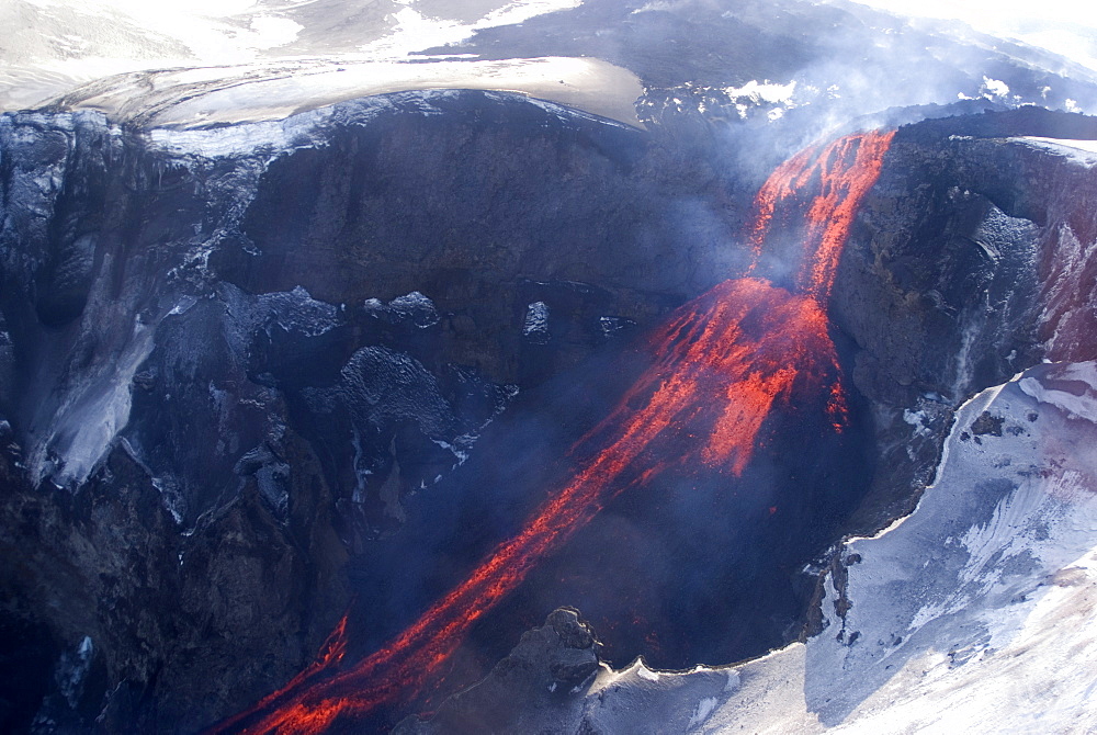 Lava flowing down mountain from Eyjafjallajokull volcano, Iceland, Polar Regions