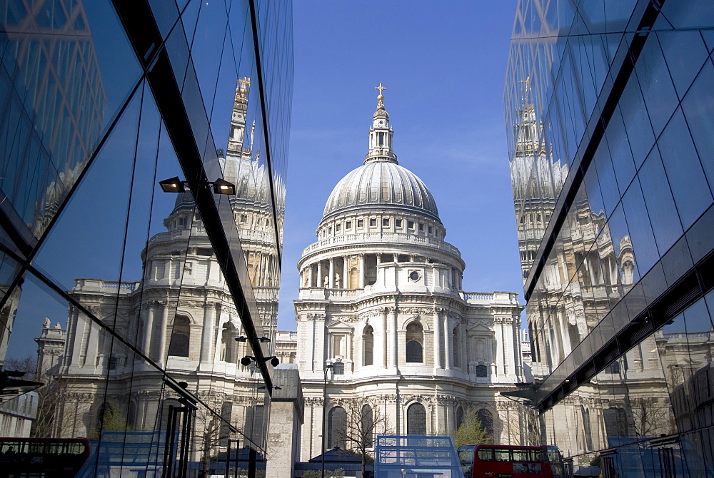 The dome of St. Paul's Cathedral reflected in glass walls, London, England, United Kingdom, Europe