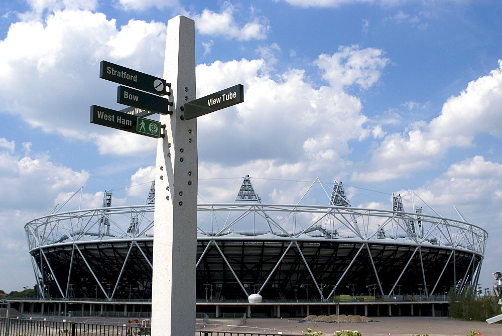 Signpost for the Greenway, with the OIympic Stadium behind, Stratford, London, England, United Kingdom, Europe