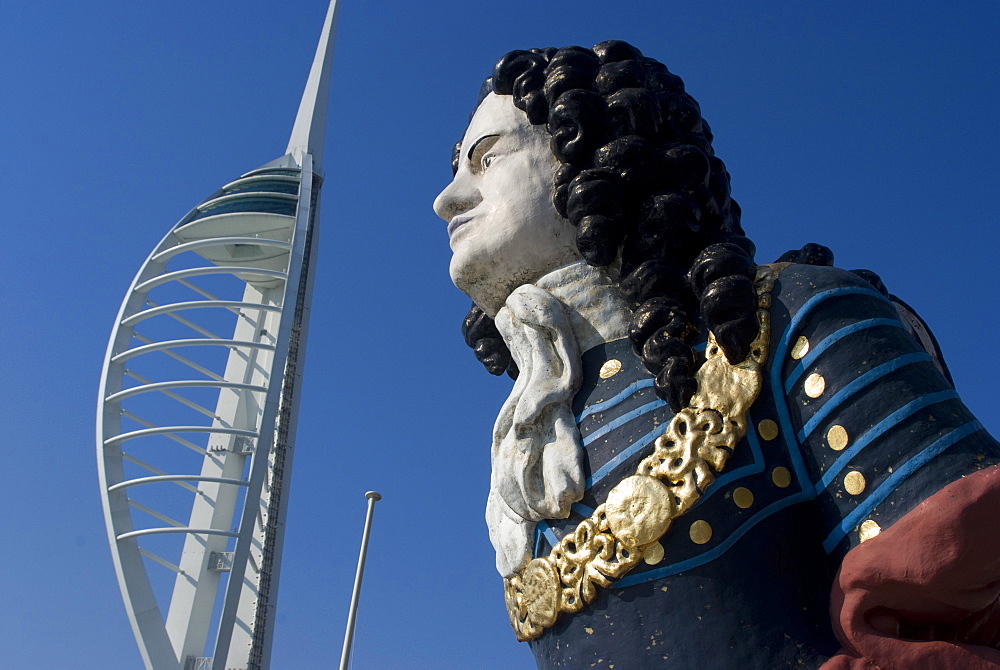 Ship figurehead with Spinnaker Tower behind, Gunwharf, Portsmouth, Hampshire, England, United Kingdom, Europe