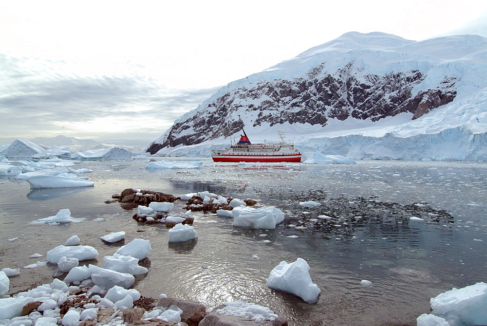 Cruise ship moored at Neko Harbor, Antarctica, Polar Regions