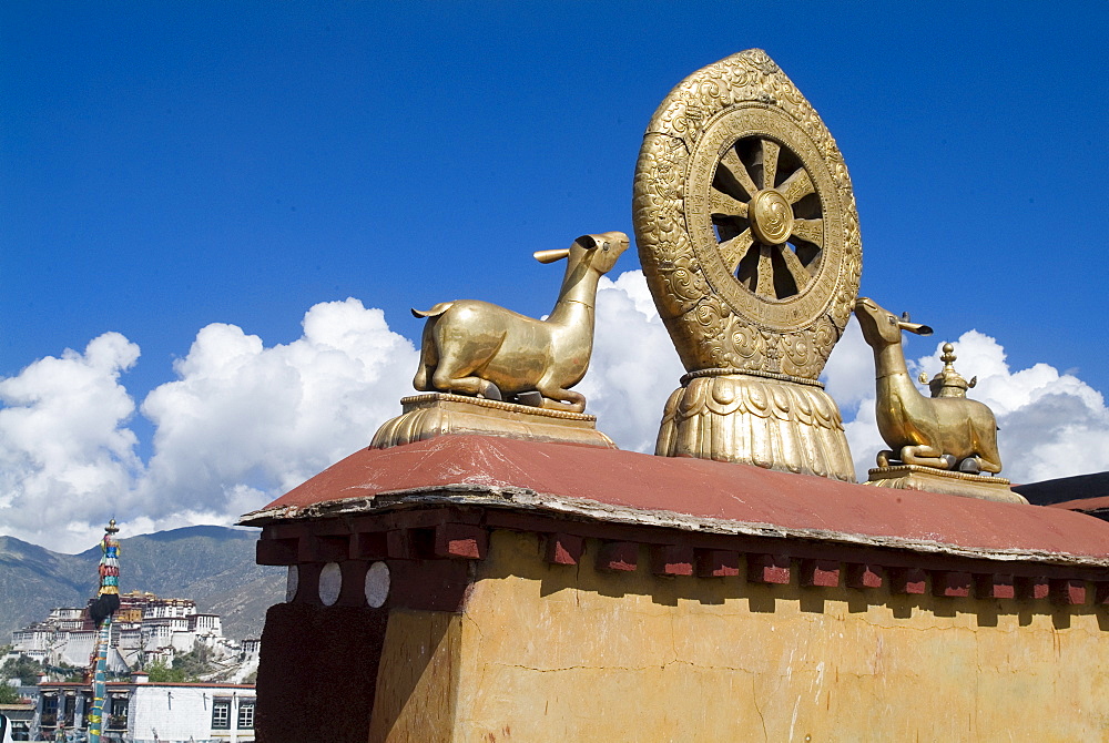 Jokhang Temple, the most revered religious structure in Tibet, with Potala Palace in the distance, Lhasa, Tibet, China, Asia