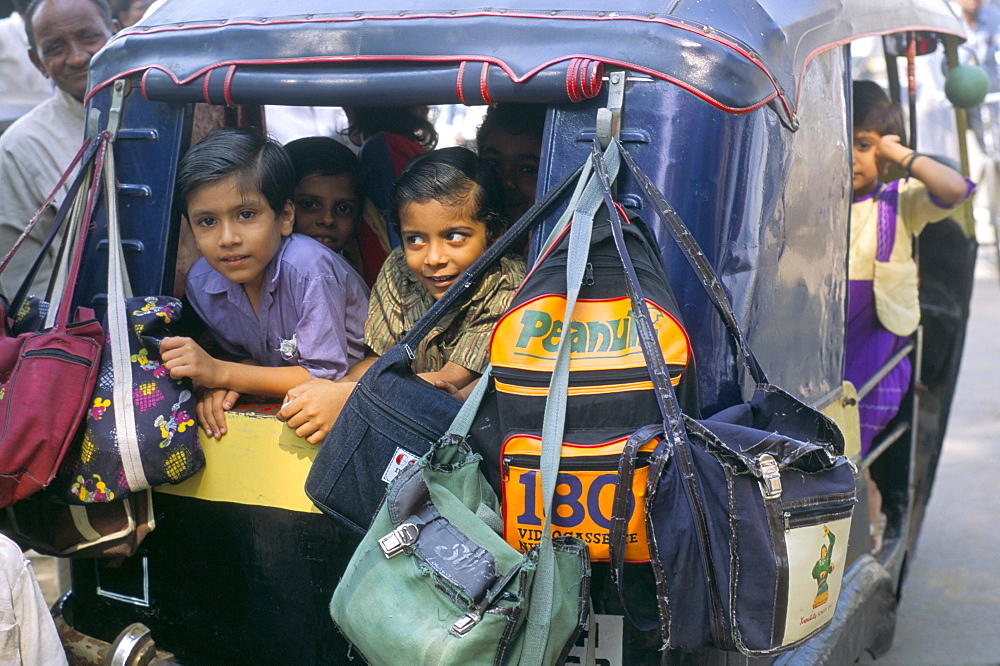 Children in autorickshaw, India, Asia