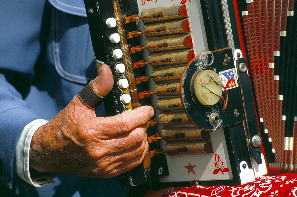 Close-up of man playing accordian