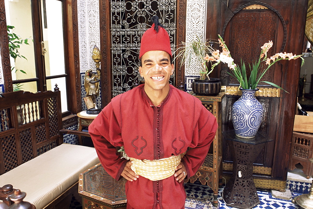 Portrait of a hotel worker in uniform, Hotel Ryad Arabesque, Fez, Morocco, North Africa, Africa