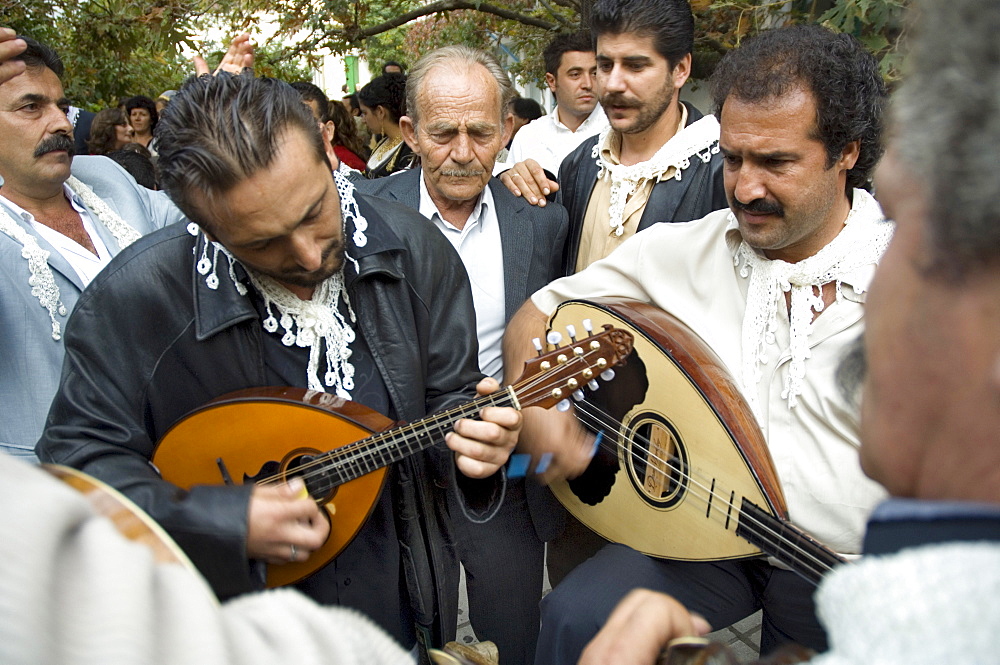 Musicians attending a village wedding, Anogia, Crete, Greek Islands, Greece, Europe