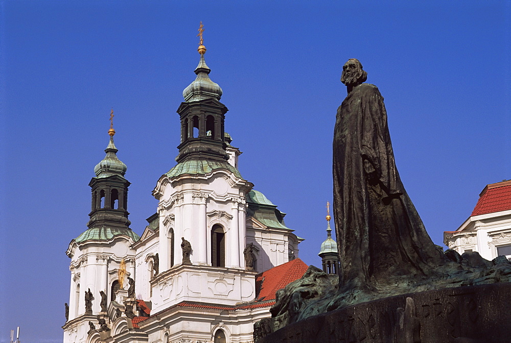 Jan Hus Monument and Church of St. Nicolas, Old Town Square, Prague, Czech Republic, Europe