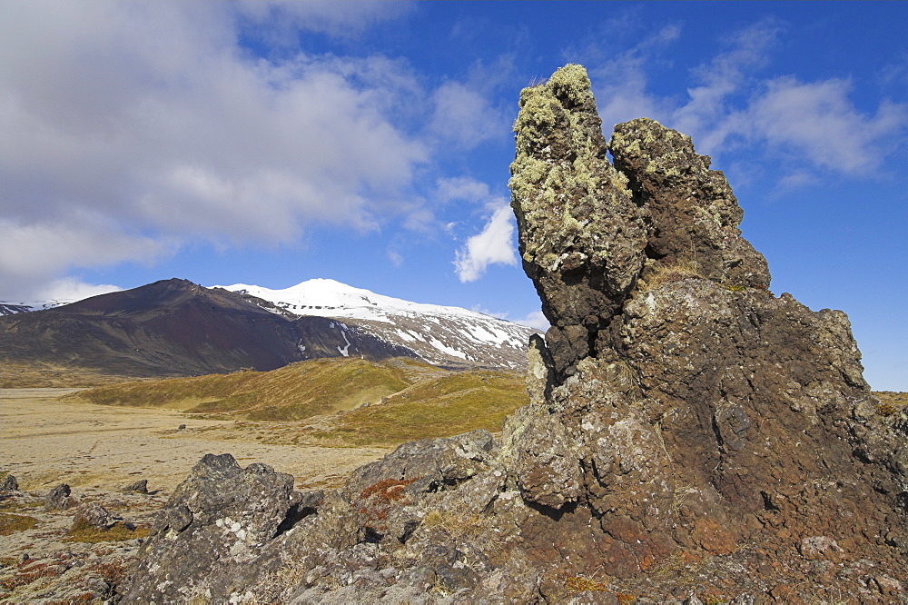 Lava beds surround Snaefellsjokull, an active strato volcano capped in snow and ice, on the Snaefellsnes Peninsula, North West area, Iceland, Polar Regions