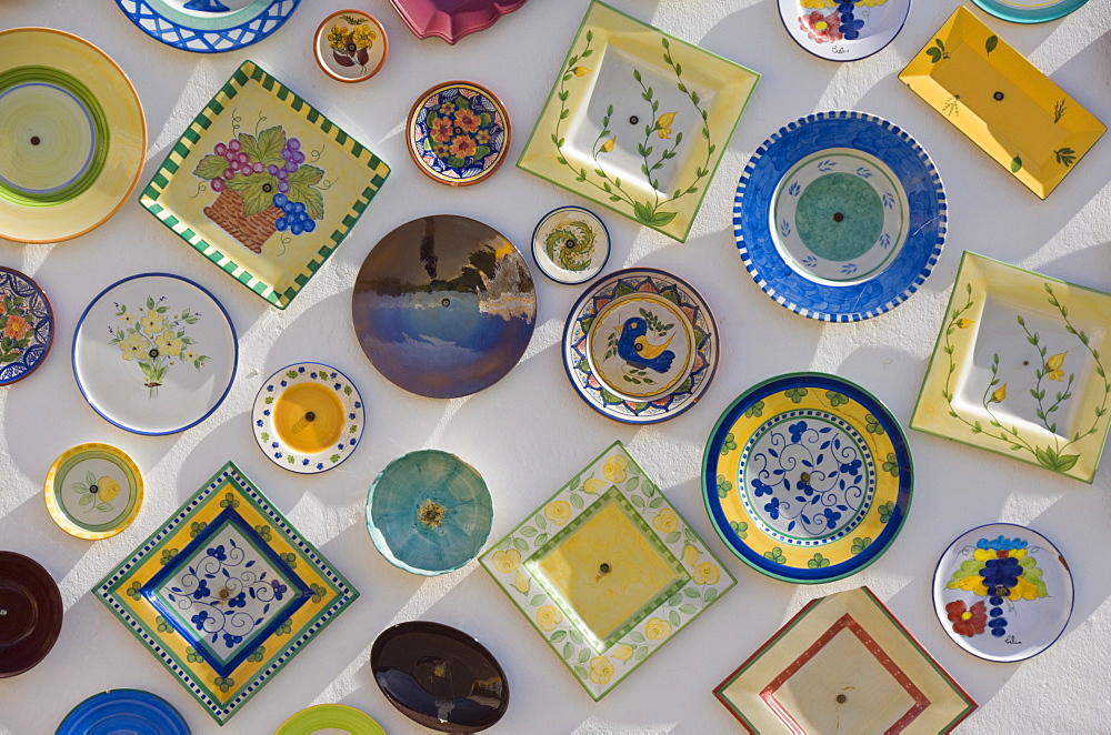 Traditional Portuguese pottery at artisan workshop with plates on wall, Cape St. Vincent peninsula, Sagres, Algarve, Portugal, Europe