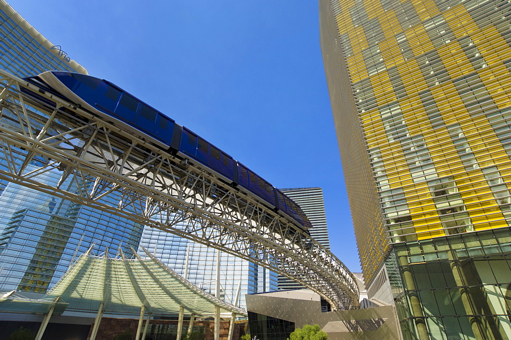 Monorail in front of the Aria Resort Hotel and Veer Towers Condo Hotel, CityCenter complex, Las Vegas Boulevard South, The Strip, Las Vegas, Nevada, United States of America, North America