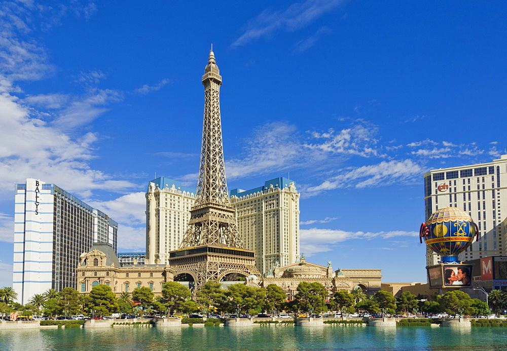 Lake Bellagio with Bally's Hotel, Paris Hotel with the Eiffel Tower and Montgolfier balloon sign, The Strip, Las Vegas Boulevard South, Las Vegas, Nevada, United States of America, North America