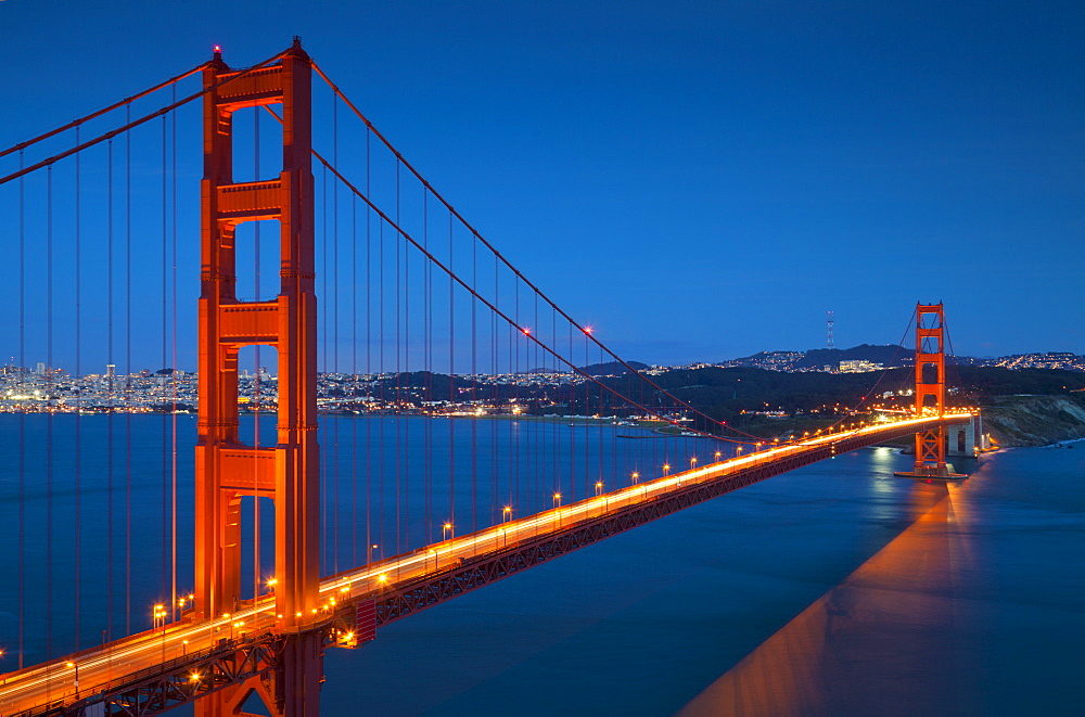 The Golden Gate Bridge, from the Marin Headlands at night with the city of San Francisco in the background and traffic light trails across the bridge, Marin County, San Francisco,  California, United States of America, North America