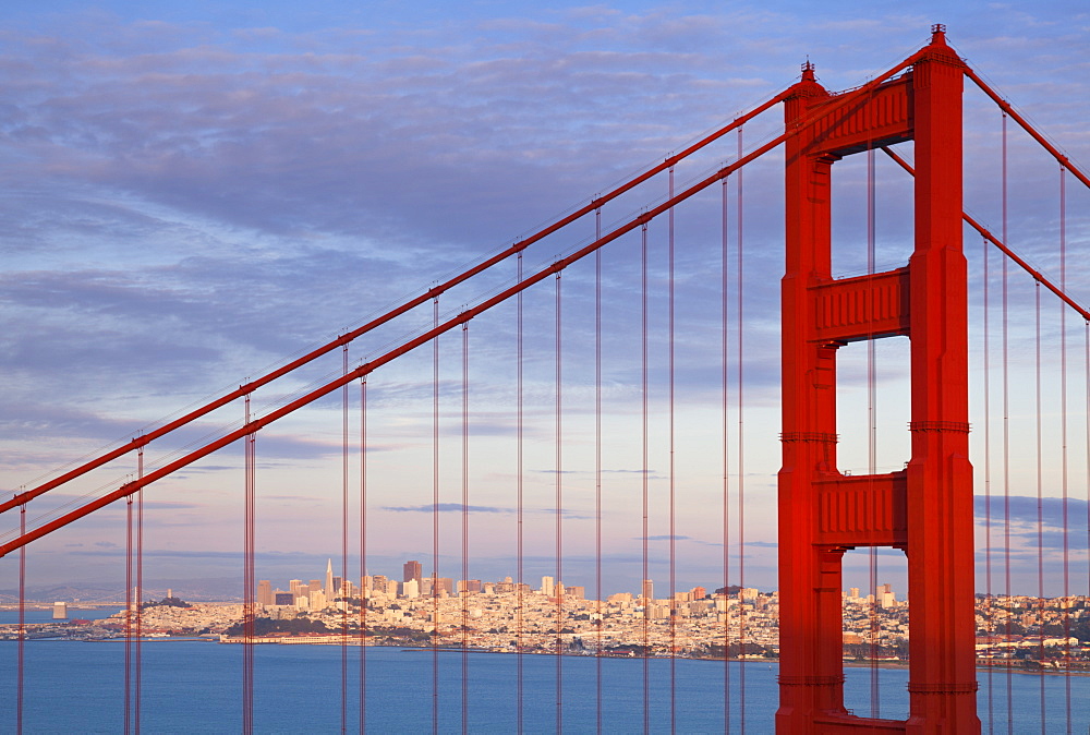 The Golden Gate Bridge, linking the city of San Francisco with Marin County, taken from the Marin Headlands at sunset with the city in the background, Marin County, San Francisco,  California, United States of America, North America