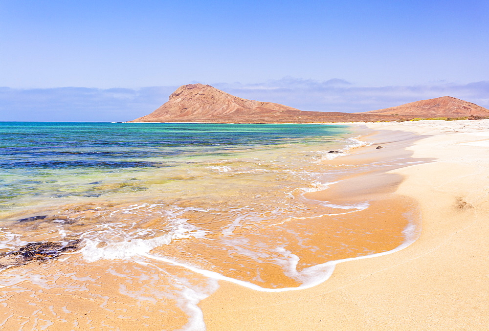 Empty sandy beach and bay near Monte Leao mountain (Sleeping Lion mountain), Sal Island, Cape Verde, Atlantic, Africa