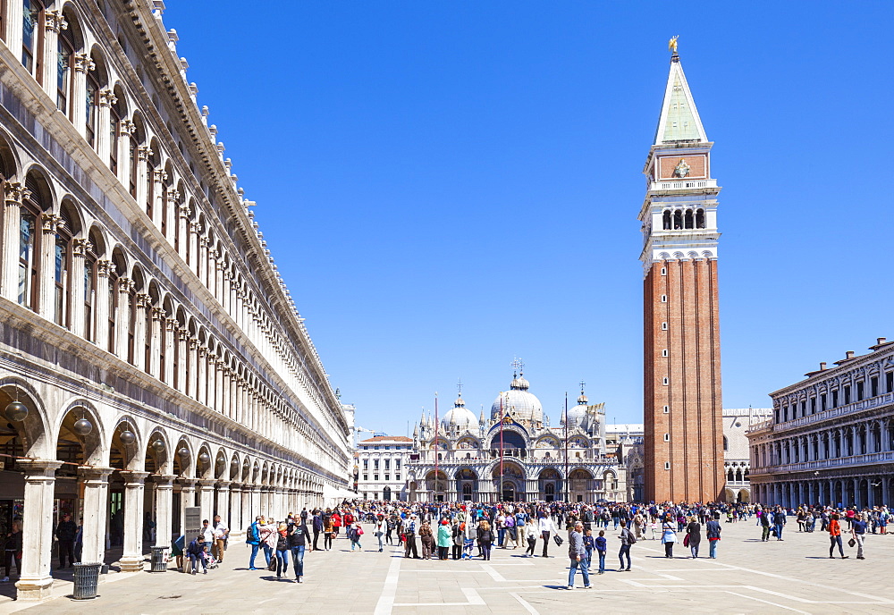 Campanile tower, Piazza San Marco (St. Marks Square) with tourists and Basilica di San Marco, Venice, UNESCO World Heritage Site, Veneto, Italy, Europe