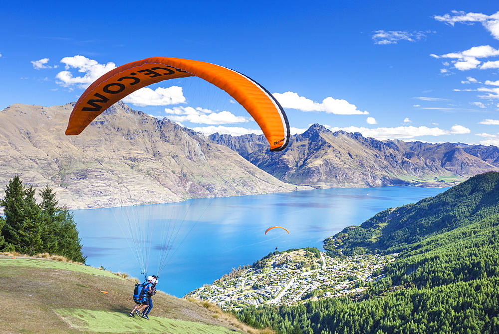 Tandem Paragliding, from Bob's Peak above Lake Wakatipu, Queenstown, Otago, South Island, New Zealand, Pacific