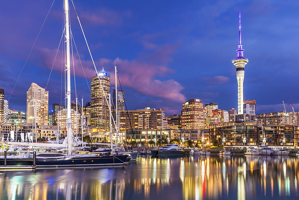 Viaduct Harbour waterfront area and Auckland Marina at night, Auckland skyline, Sky Tower, Auckland, North Island, New Zealand, Pacific