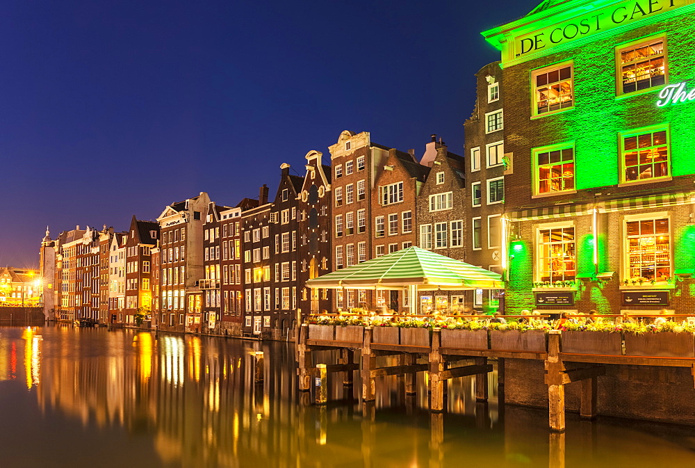 The Grasshopper steakhouse on Oudebrugsteeg Damrak canal with typical dutch houses, central Amsterdam, North Holland, Netherlands, Europe