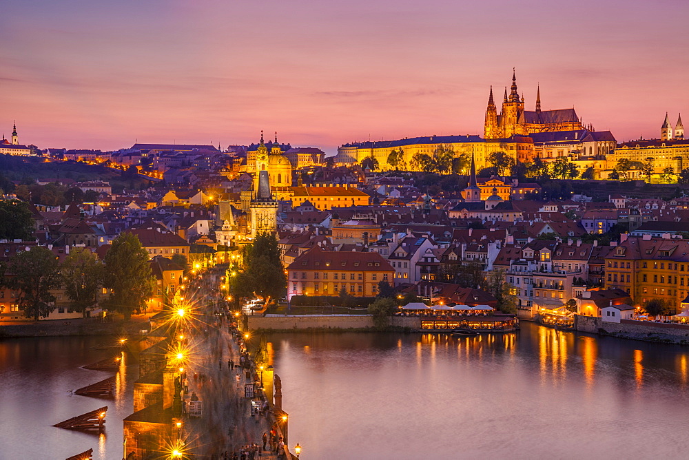 Prague skyline at night with Charles Bridge, River Vltava, Prague Castle and St. Vitus Cathedral, UNESCO World Heritage Site, Prague, Czech Republic, Europe