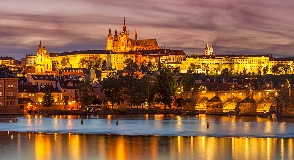 Prague skyline at night with Prague Castle, St. Vitus Cathedral, Mala Strana and Charles Bridge, UNESCO World Heritage Site, Prague, Czech Republic, Europe