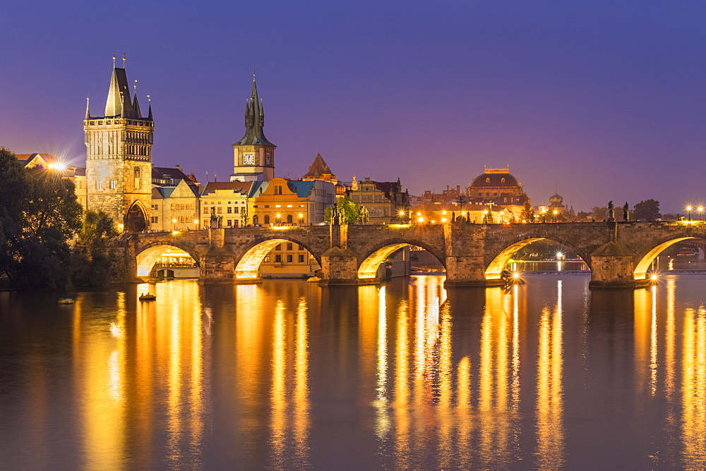 Prague Charles bridge, Old town bridge tower and river Vltava at night, UNESCO World Heritage Site, Prague, Czech Republic, Europe