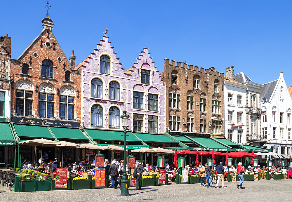 Cafes in the Market Square in the centre of Bruges, West Flanders, Belgium, Europe