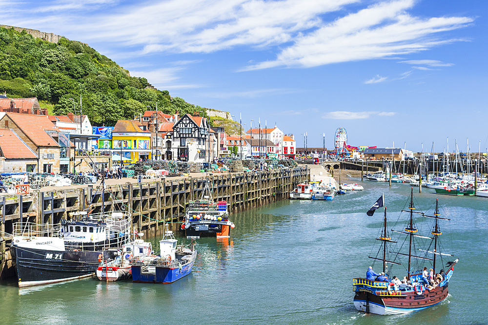 Tourist boat trips from Scarborough harbour in South Bay, Scarborough, North Yorkshire, England, United Kingdom, Europe