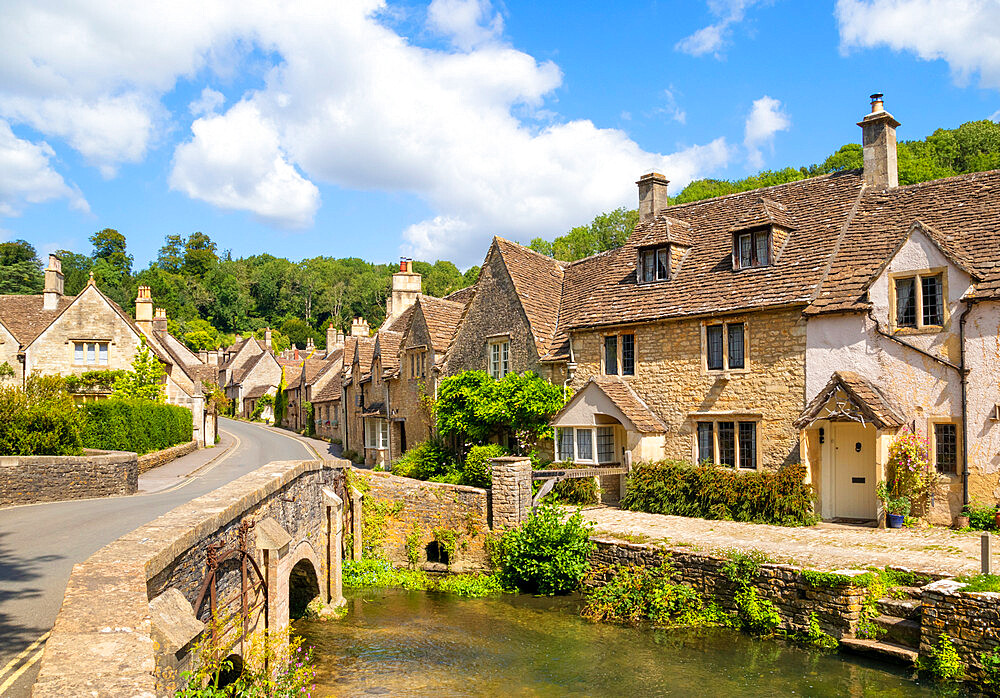 Water Lane with bridge over By Brook on to The Street, Castle Combe village, Castle Combe, Cotswolds, Wiltshire, England, United Kingdom, Europe