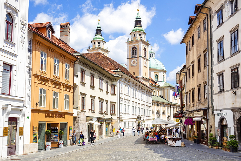 People walking towards Roman Catholic Cathedral (Ljubljana Cathedral) on Cyril Methodius Square, Old Town, Ljubljana, Slovenia, Europe