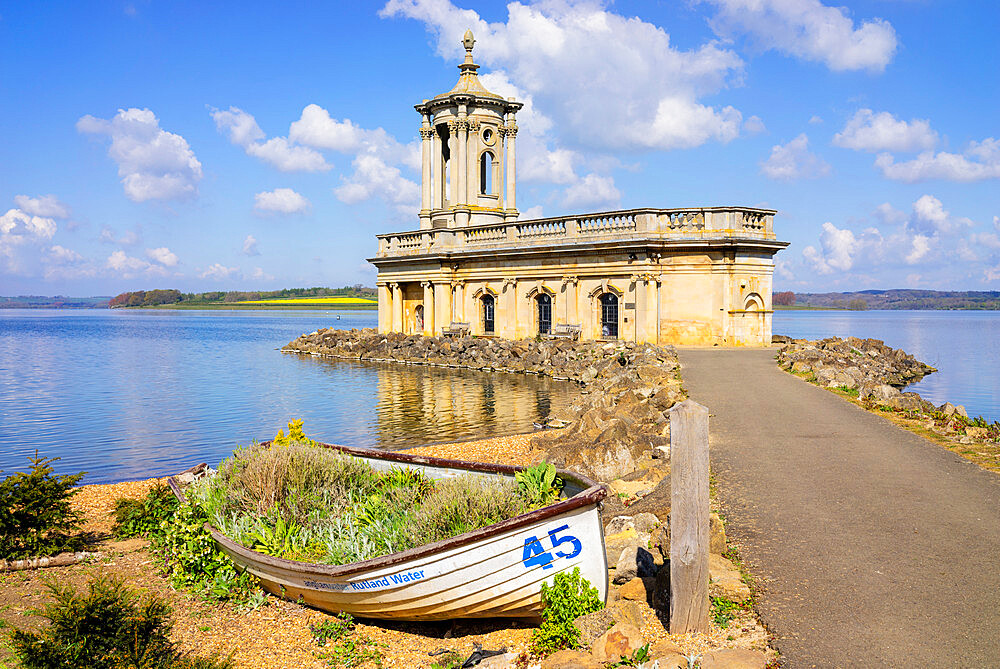 Normanton Church (St. Matthews Church) with small boat, Rutland Water reservoir, Rutland, East Midlands, England, United Kingdom, Europe