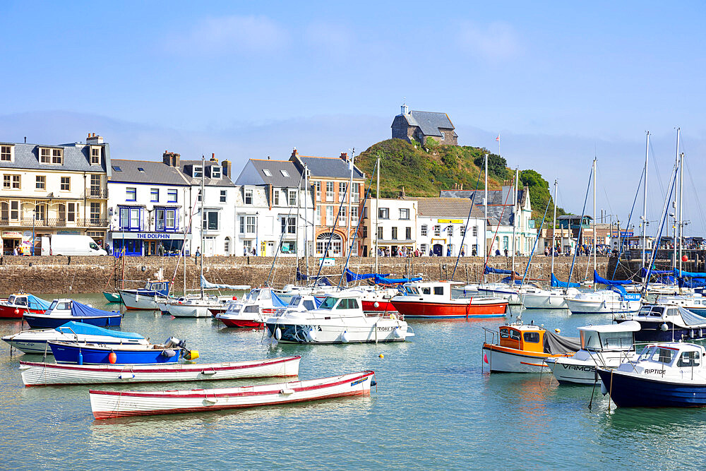 Ilfracombe harbour with yachts and St. Nicholas Chapel overlooking the town of Ilfracombe, Devon, England, United Kingdom, Europe