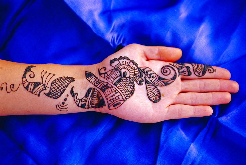 Woman's hand decorated with henna design, Rajasthan, India