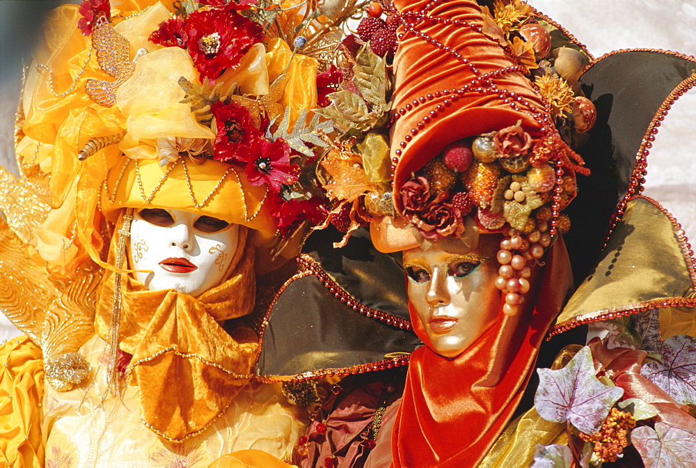 People wearing masked carnival costumes, Venice Carnival, Venice, Veneto, Italy