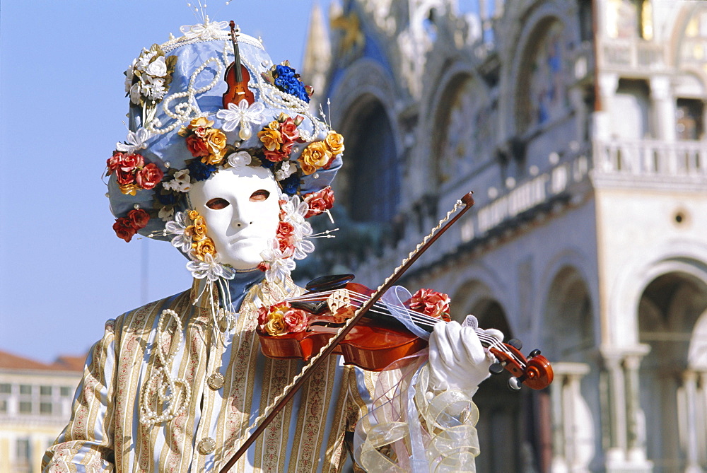 Person wearing masked carnival costume, Venice Carnival, Venice, Veneto, Italy