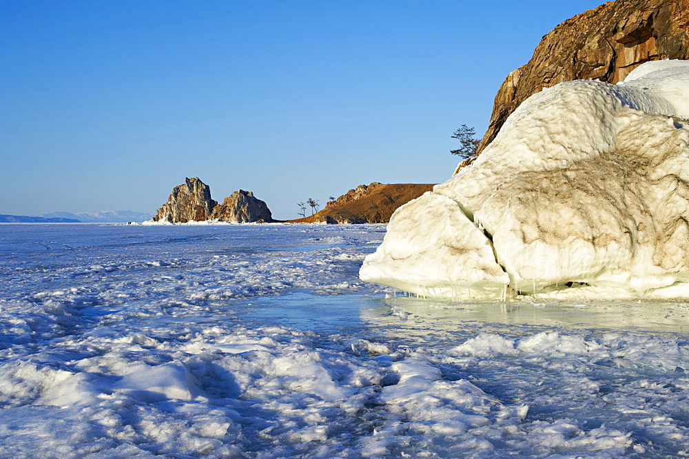 Shaman rock, Maloe More (Little Sea), frozen lake during winter, Olkhon island, Lake Baikal, UNESCO World Heritage Site, Irkutsk Oblast, Siberia, Russia, Eurasia 