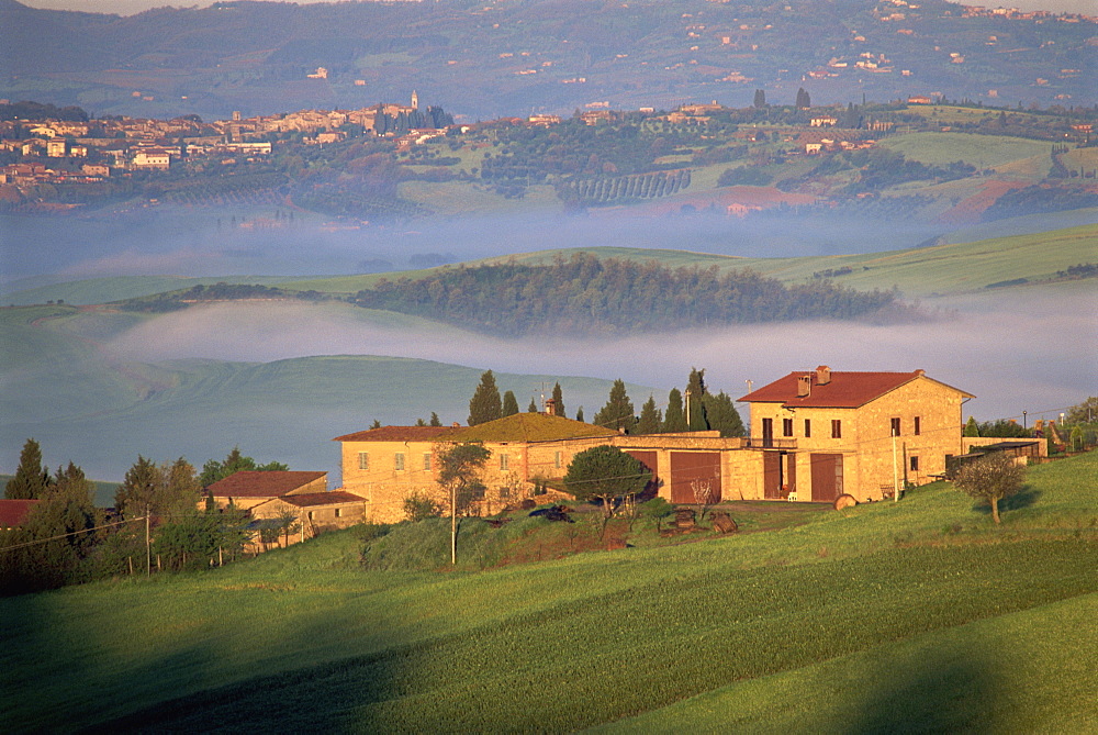 Houses in a misty landscape near Pienza, Siena Province, Tuscany, Italy, Europe