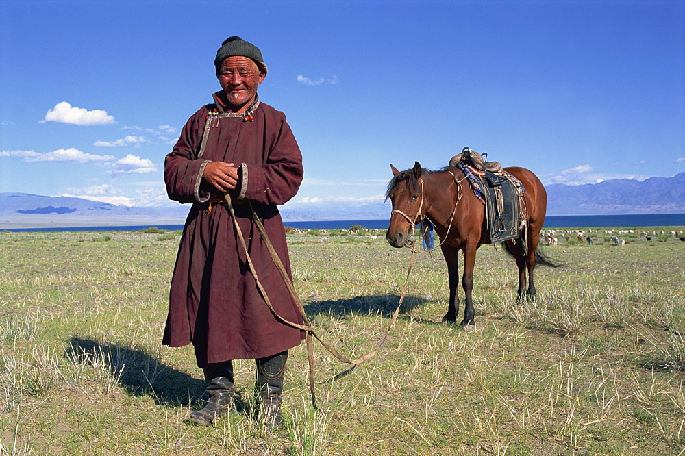 Lake Uureg Nuur, nomad and his horse, Uvs, Mongolia, Central Asia, Asia