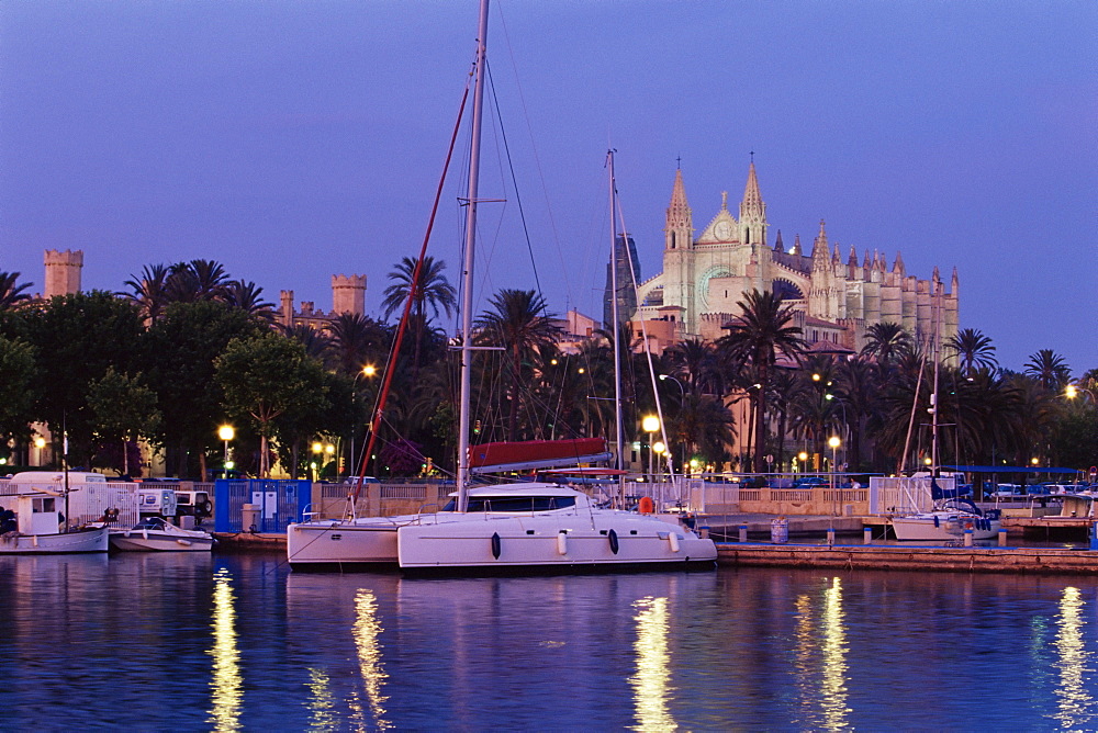 Palma cathedral from the harbour at dusk, Palma de Mallorca, Majorca, Balearic Islands, Spain, Mediterranean, Europe