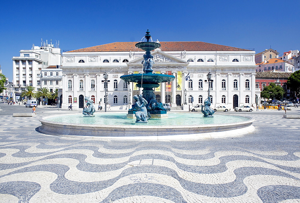 Mosaic paving and fountain with Lisbon Opera House in the background, Praca Dom Pedro IV (Rossio Square), Lisbon, Portugal, Europe