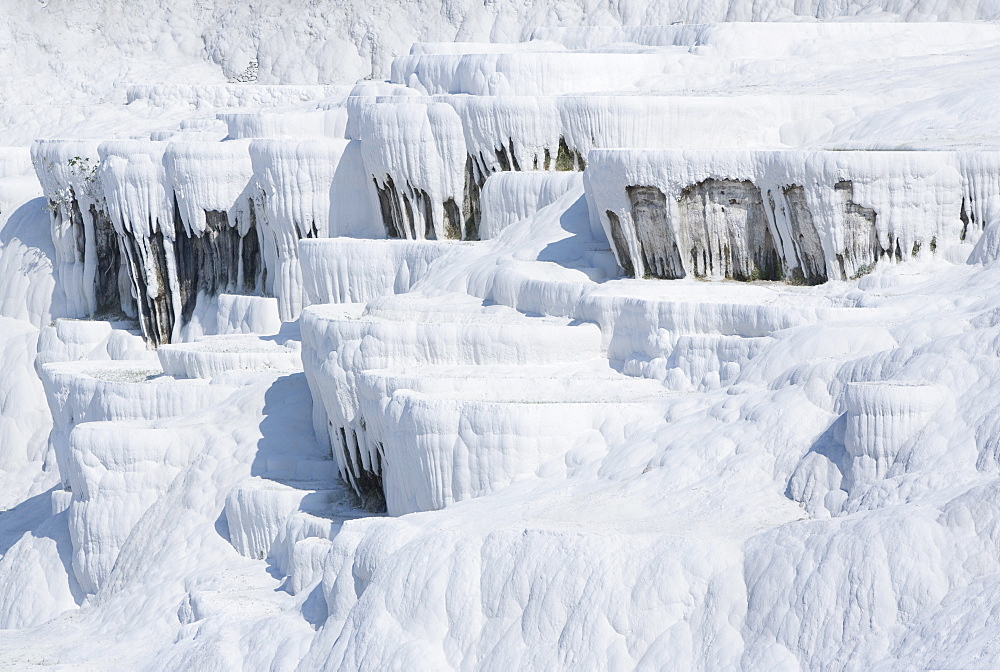 Gleaming white travertine terraces, nicknamed Cotton castles, Pamukkale, UNESCO World Heritage Site, Anatolia, Turkey, Asia Minor, Eurasia