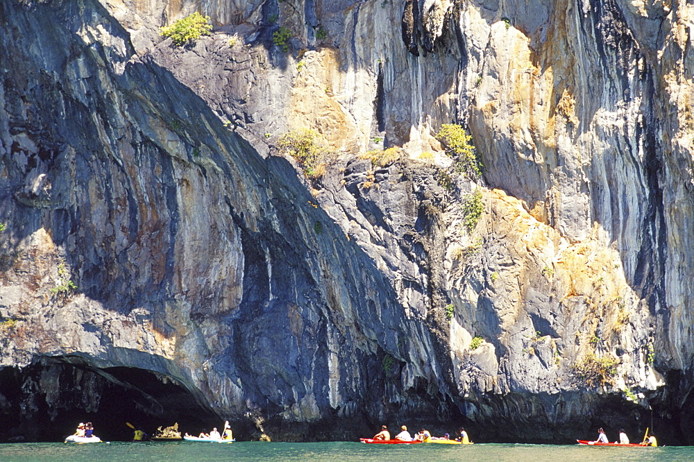 People canoeing near Tham Law (tube cove), Ao Phang-Nga Marine Park, Phang Nga province, Thailand, Southeast Asia, Asia