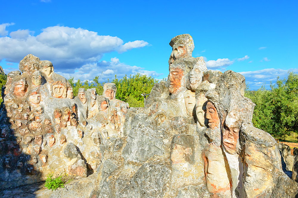 Heads carved into rocks at Enchanted Castle, Sciacca, Agrigento district, Sicily, Italy, Mediterranean, Europe