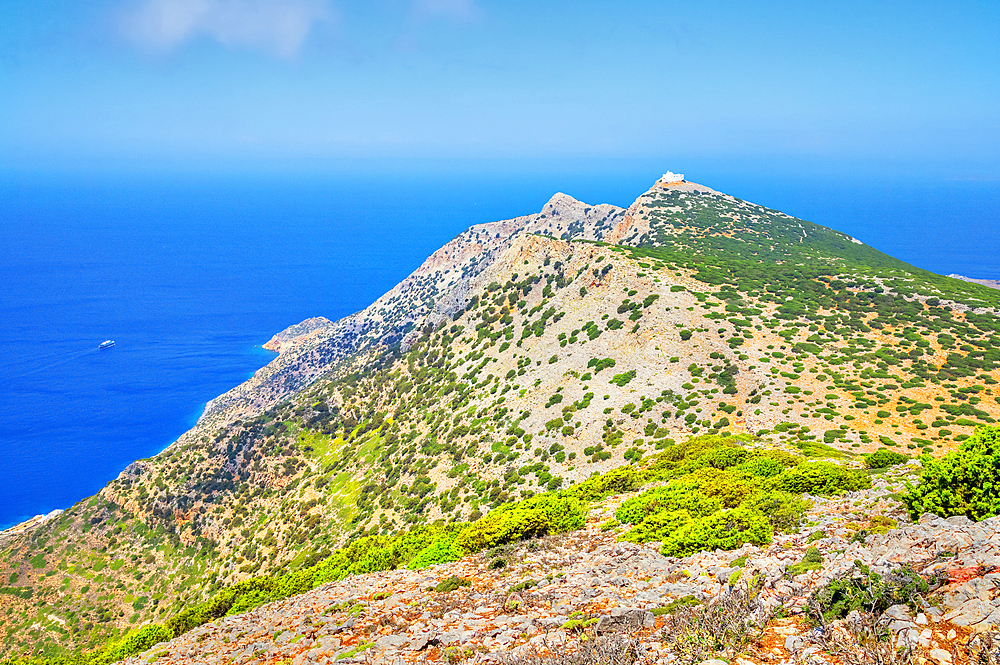 View of Prophet Elias Monastery perched on the top of Sifnos Island northern coast, Sifnos Island, Cyclades Islands, Greece