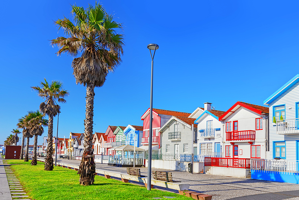 Brightly painted beach homes, Costa Nova do Prado, Aveiro, Portugal, Europe