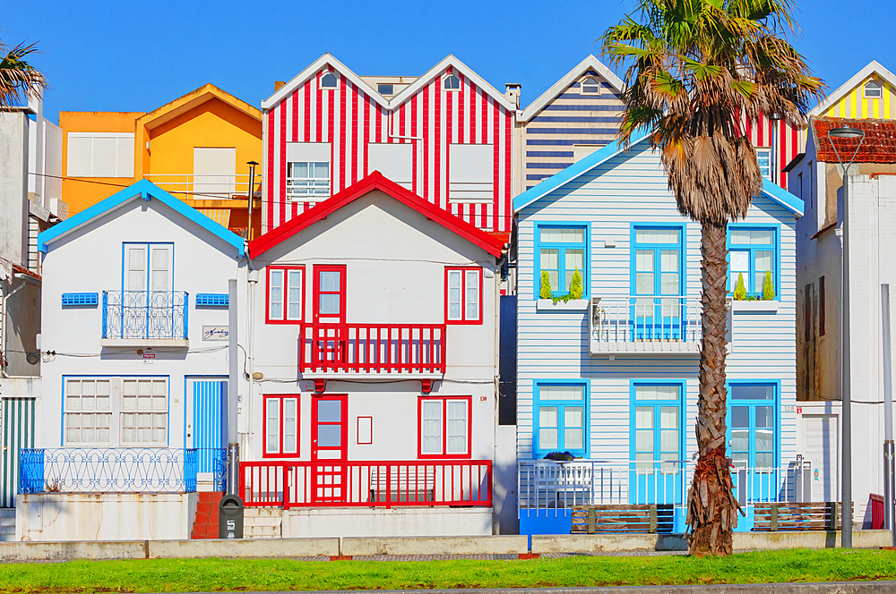 Brightly painted beach homes, Costa Nova do Prado, Aveiro, Portugal, Europe