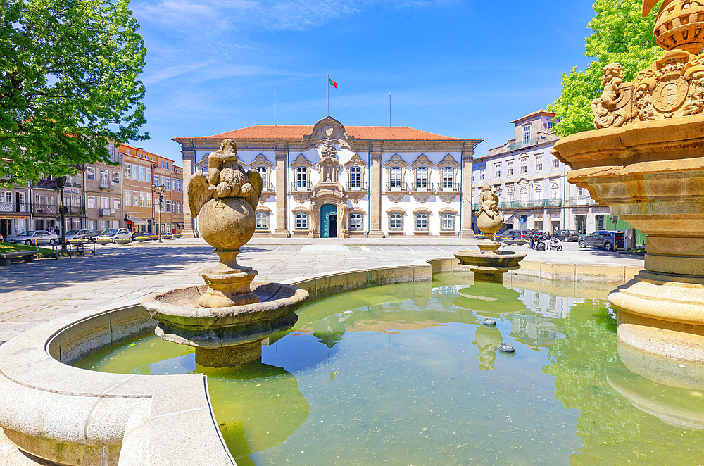 View of Pelican fountain and Braga town hall in the background, Braga, Minho Province, Portugal