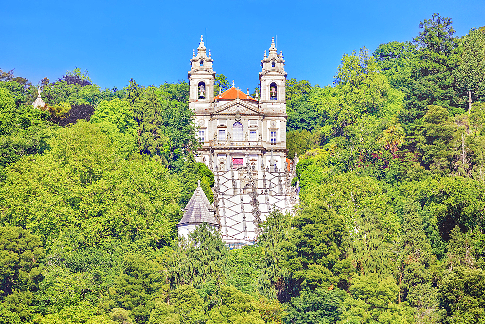 View of Bom Jesus do Monte santuary immersed in the greenery of the surrounding woods, Braga, Minho Province, Portugal