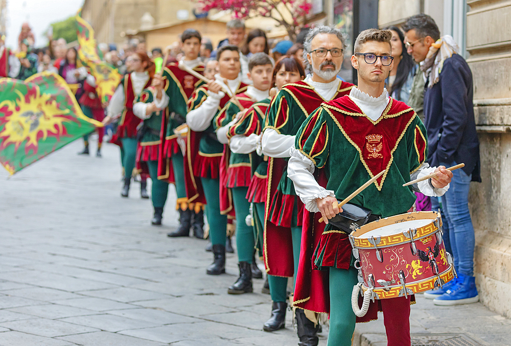 Participants wearing historical costumes on parade, Noto, Noto Valley, Sicily, Italy